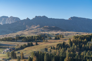 Fototapeta na wymiar Beautiful Landscapes on Alpe di Siusi with Mountains in background in autumn, South Tyrol, Italy