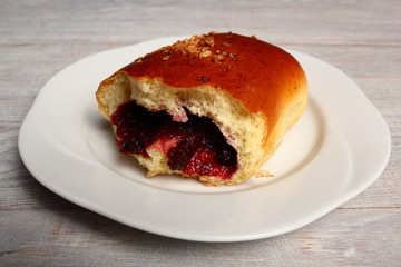 Blueberry Bun. Bun made from yeast dough, filled with bilberries, delicately covered with crumble.