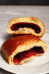 Blueberry Bun. Bun made from yeast dough, filled with bilberries, delicately covered with crumble.