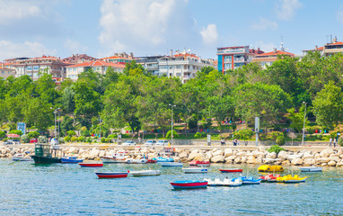 Colorful pleasure and fishing boats are moored in Avcilar