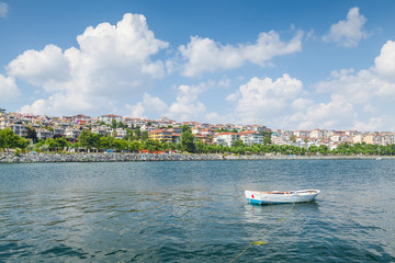 Fototapeta na wymiar Small wooden fishing boat is moored in Avcilar, Turkey