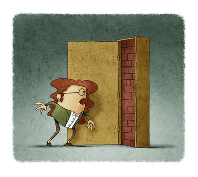 Business woman has opened a door and is covered with bricks. adversity concept