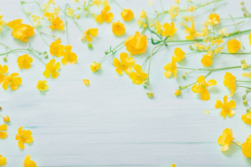 summer flowers on green wooden background