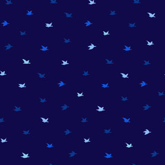 Fototapeta premium Small swallow Birds Summer Print. Seamless Pattern with Simple Birds Silhouettes. Classic Blue Concept. Color of the year 2020. Elegant flying crabe birds wings on blue background