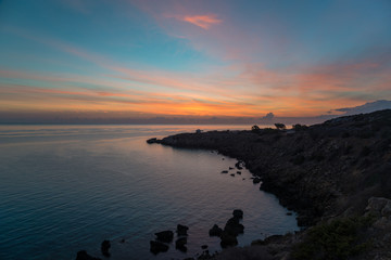 Cape Greco against sunrise scene