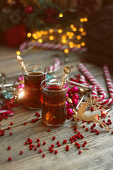 Christmas sweets and tea cups, festive composition. Christmas decor on wooden table background. Christmas and new year holiday concept. atmosphere tradition christmas image