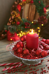 winter holidays composition. Christmas and new year festive concept. Christmas table decoration with burning red candle. atmosphere tradition christmas image. copy space
