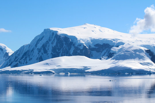 Mountains and icebergs between the islands around the Antarctic Peninsula, Palmer Archipelago, Antarctica © Marco Ramerini