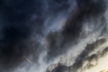 clouds in the sky with planes