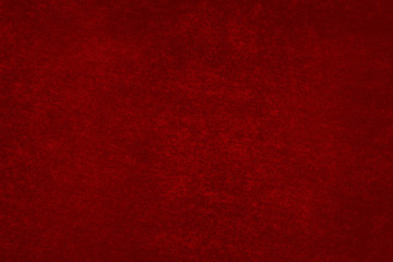 Fondo rojo de una pared con manchas.