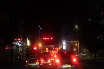 Fototapeta premium Night road in the city of lights cars traffic jams