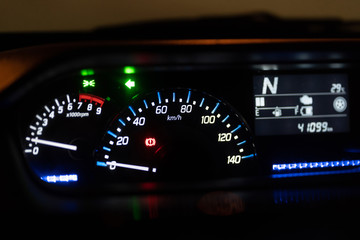 Fototapeta premium Modern car illuminated dashboard closeup