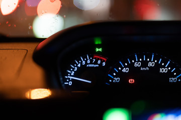 Modern car illuminated dashboard closeup
