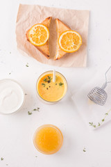 Lassi breakfast with mango and sandwich.