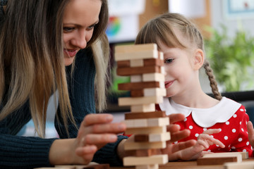 Cute child playing with toys