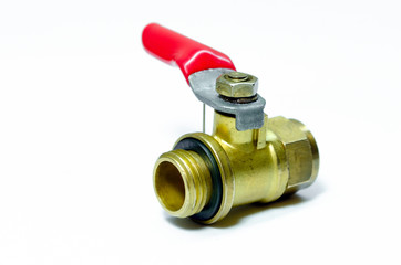 Plumbing brass connection fixtures and piping parts on white background