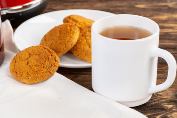 Tea served on a wooden kitchen table