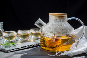 The Time of Tea Break.tea ceremony,Cup of freshly brewed fruit and herbal tea, dark mood.