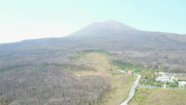 View drone with road in the mountains and the Vesubius volcano in Pompeya, Italy