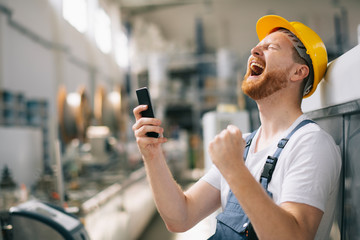 Happy factory worker won. 