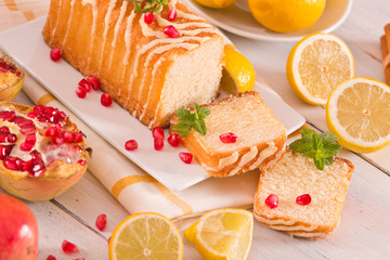 Lemon sponge cake with pomegranate.