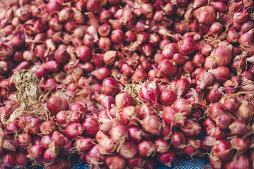 vegetables and potatoes are on sale in the fresh market