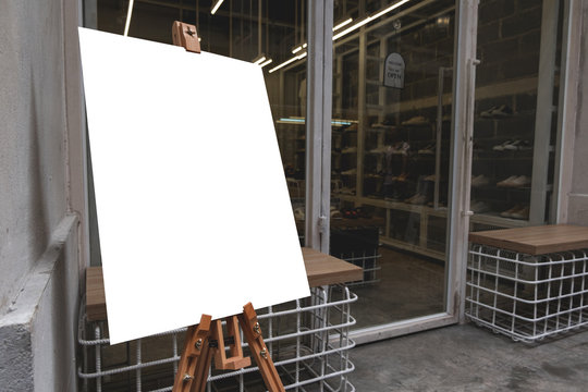 Mockup billboards or white promotion poster displayed on the front of the restaurant, coffee shop Promotion information for marketing announcements and details