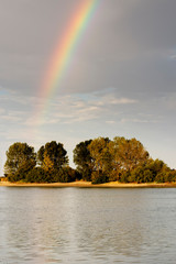 rainbow in lake in the north of spain