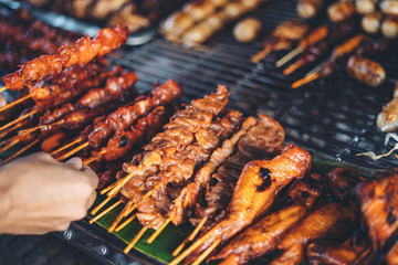 Fried and grilled foods at the street market in Pai