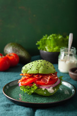 keto paleo diet avocado burger with bacon, lettuce, tomato