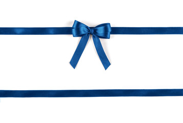 Shiny blue silk ribbon isolated on white background. Festive concept. Flat lay.