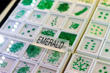 Faceted emerald gemstone for sale in the jewelry store.