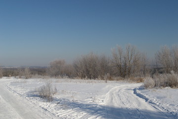Fototapeta na wymiar Winter landscape in forest and fields