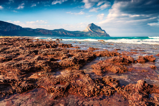 Exotic morning view of Monte Cofano nature reserve. Impressive vollcanic scene of Macari Beach (Cala della Bruca), San Vito cape. Spectacular spring seascape of Mediterranean sea, Sicilia, Italy.