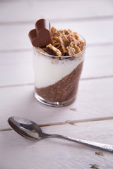 Delicious breakfast, cocoa chia pudding with yogurt and cereals
