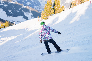 Man snowboarder on Penken Park ski resort in Austria