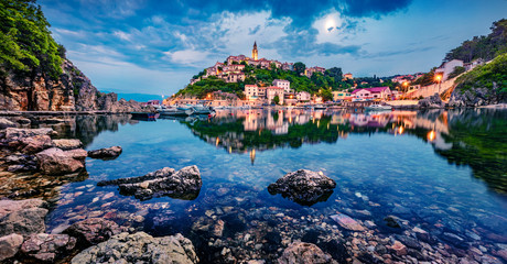 After a hot day, a small resort town Vrbnik  is relaxing. Splendid summer seascape of Adriatic sea,...