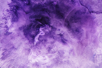 Violet lilac liquid abstract art background. Splashes and stains of paint, emotional concept