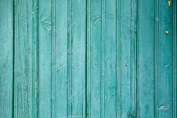 Old blue-green wooden planks wall