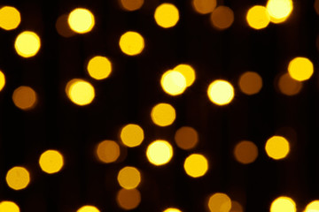 abstract background - photo of yellow bokeh on a black