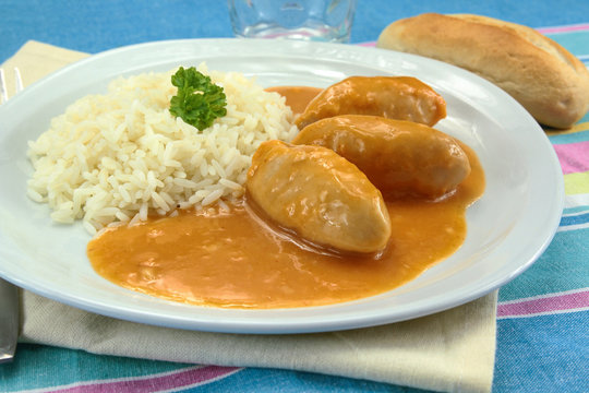 Pike Dumplings With Nantua Sauce On A Plate