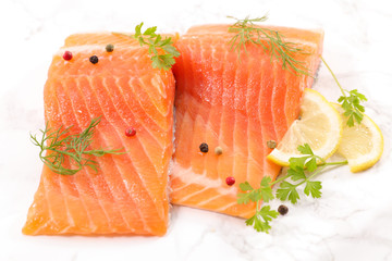raw fish, salmon fillet with dill and lemon