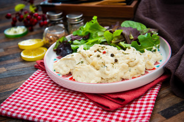 Traditional Parmentier of fish with chives