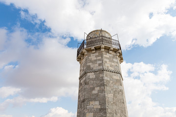 The minaret and the mosque roof of the Muslim part of the grave of the prophet Samuel on Mount of Joy near Jerusalem in Israel