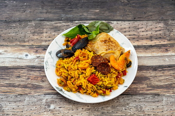 Prawn with rice - closeup of prawn with rice - traditionnal spanish food paella