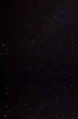 Studio portrait of beautiful brunette woman wearing dark dress