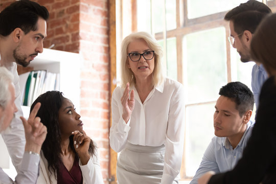 Boss Defines Tasks And Corporate Goals For Staff At Meeting