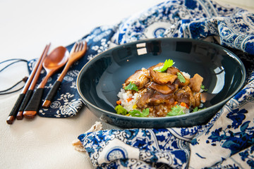 Asian style caramel pork with rice and vegetable