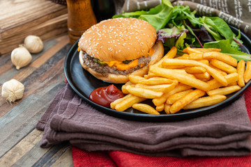 Cheese burger - American cheese burger with Golden French fries