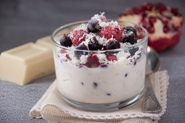 Dessert with cottage cheese, yogurt, oatmeal, berries and white chocolate